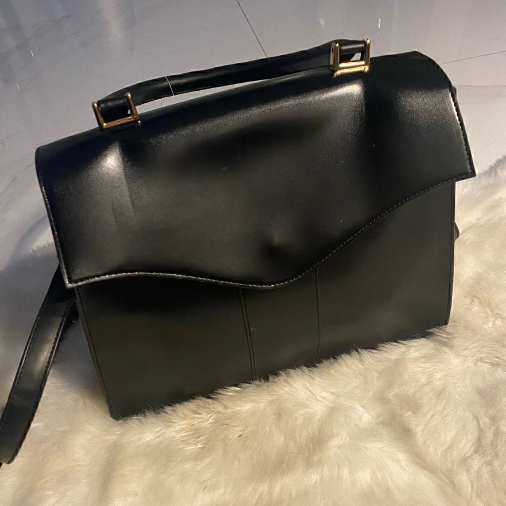 Boutique black faux leather bag has flaws #10